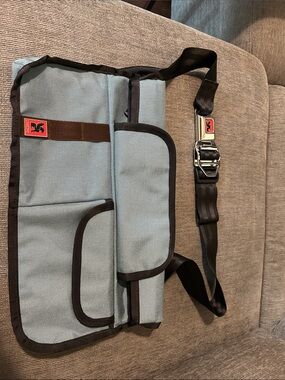 Light Blue Messenger Bag with Black Trim and Adjustable Strap